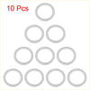 Ten clear translucent silicone oil drain plug gaskets arranged in a pyramid for toyota m18 silver tone