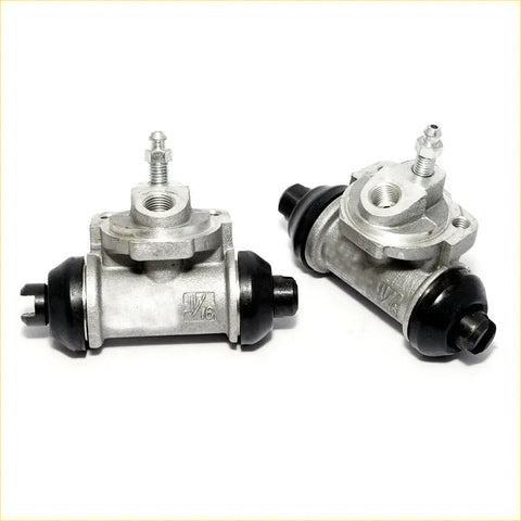 Silver metal 11/16 rear wheel brake cylinder with black rubber caps and threaded fittings for nissan bluebird 2.0l