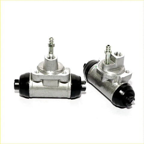 Silver and black metallic 13/16 rear wheel brake cylinder for nissan caravan urvan homy e24 1986-1997 shown from back side