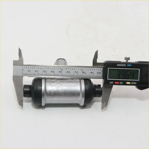 Silver and black rear wheel brake cylinder with matte finish and engraved branding for nissan d21 navara ute 1986-1997