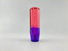 A 15cm bubble gear knob in purple pink with a translucent red to purple gradient and bubble-like inclusions