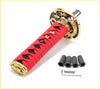 15cm red and black katana samurai gear knob with red cord wrapped hilt and gold dragon engraved metal fittings