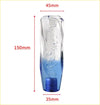 A 15cm tsuisuta knob gear knob made of transparent glass with a swirling blue gradient and floating bubbles lava lamp design