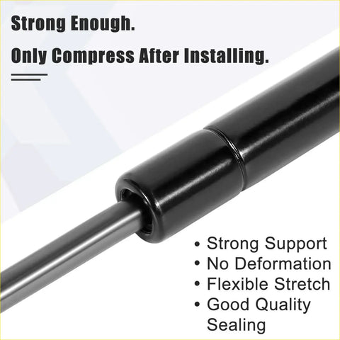 Black metal gas spring with sleek cylindrical design and polished finish 2 x front bonnet lift supports for toyota 4runner 2003-2004