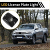 Black led license plate light with sleek rectangular design and three horizontal vents for toyota tacoma 1995-2004