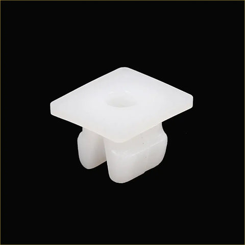 White plastic car interior trim clip with square top and two rounded feet for 4wd ute offroad bumper fender fastener clips