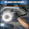 White circular oil drain plug gasket being installed under a 1990-1994 toyota 4runner engine for easy sealing