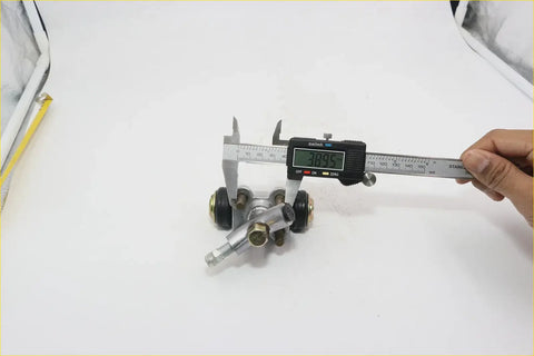 Silver metallic 3/4 inch rear brake cylinder for nissan datsun 520 measured with digital caliper close up