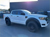 White ford ranger with black wheels and trim featuring 4-inch black stainless steel oval running board on the side
