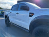 White ford ranger with 4 inch black stainless steel oval running board and rugged tires shown from the side