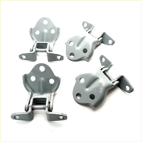 Gray metal door hinge assemblies with matte finish and circular mounting holes for mitsubishi triton l200 front doors