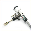 Gray metallic 5/8 clutch master cylinder with white plastic reservoir and black cap being measured by digital caliper for Toyota Hilux 1972-1978