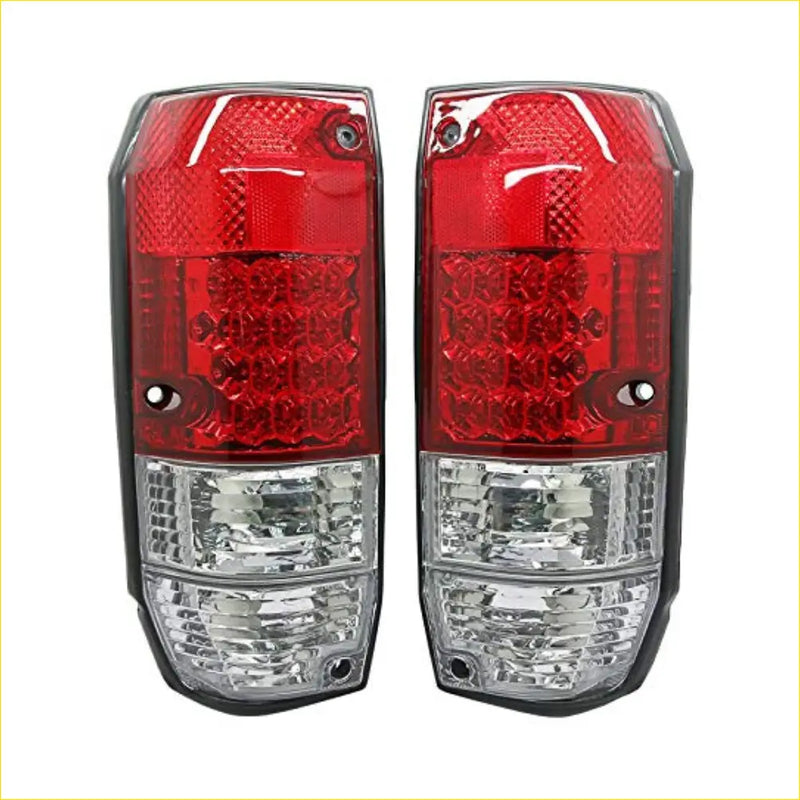70 prado led tail lights x2 with red and clear textured lenses in black plastic housings mounted on the back side