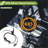 Black abs wheel speed sensor with coiled cable and plastic connector installed in toyota sienna engine bay