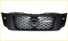 Black aftermarket grill for nissan navara nismo with honeycomb mesh pattern and fusion badge on the front grille