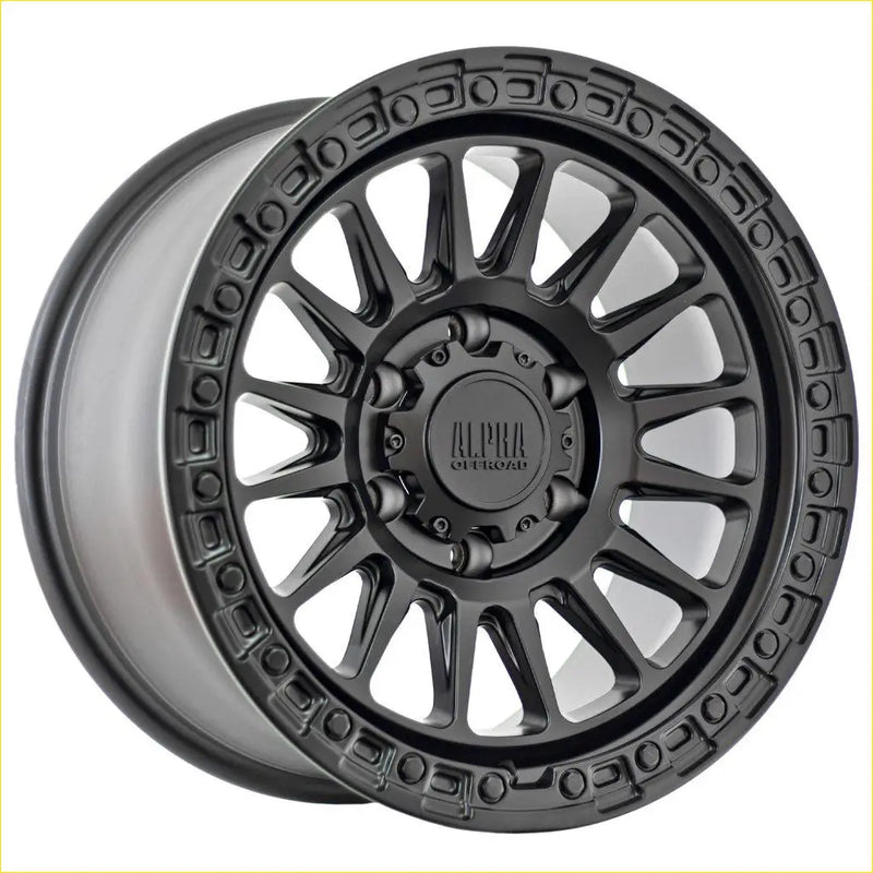 Alpha combat matt black 17x9 alloy wheel with rugged multi spoke design and aluminum off road branding at center