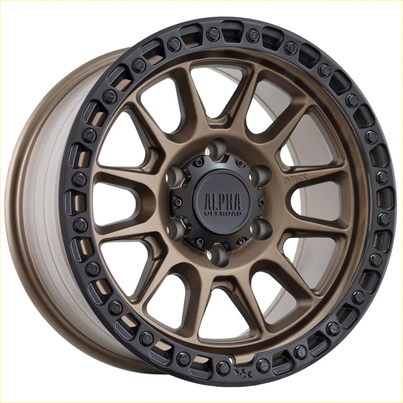 Alpha podium matt bronze with black lip 17x9 alloy wheel with rugged multi-spoke design and alpha offroad logo center