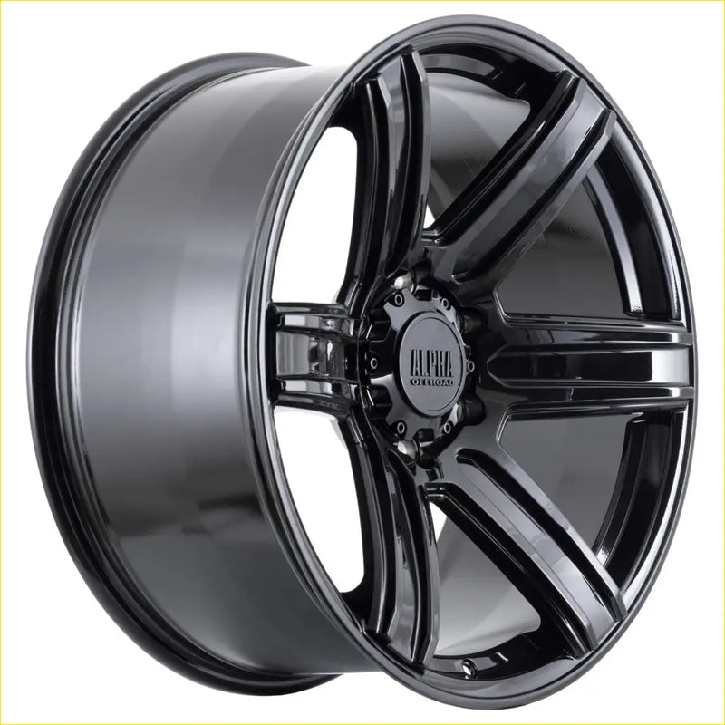 Black gloss finished alloy wheel with multi spoke design and alpha gt front logo from alpha surge gloss black 20 plus 10 6139