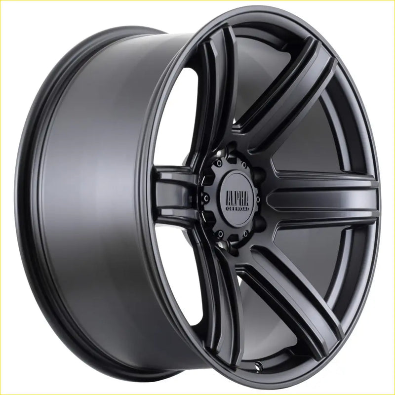 Black matte finished ALPHA SURGE alloy wheel with multi spoke design and alpina branding on center cap