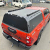 Black aluminium canopy carport cover with roof rack and led light bar for toyota hilux 2015-2025 sr5 back view