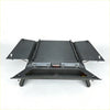 Black metal truck bed organizer with foldable side panels and central storage inside aluminium canopy for nissan navara rear view
