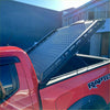 Black diamond-plate aluminum hard lid tonneau cover with integrated led lights for ford ranger 2022+ rugged design