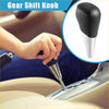 Automatic gear shift knob for toyota 4runner with black carbon fiber texture and polished chrome stem shown from the back