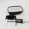 Black plastic door mirror for toyota hilux 1978-1984 with rectangular reflective surface and digital caliper on base