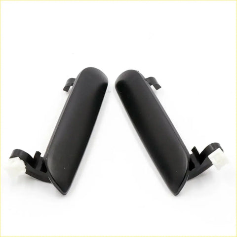 Black plastic outer door handles with molded mounting brackets for mazda b2000 b2200 b2600 bravo 1985-2006 back side view