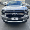 Silver ford ranger pickup with black grille and chrome accents featuring bonnet guard protector stone guard 2022+