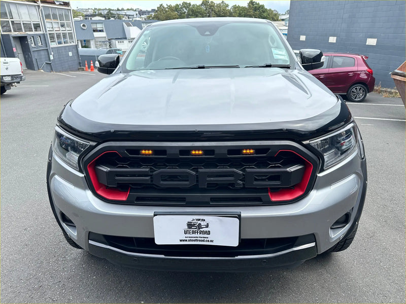 Silver ford ranger with black and red accent grille featuring bonnet guard protector stone guard for px2 px3 2016-2021