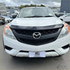 White mazda bt50 pickup with black bonnet guard stone protector for model years 2012 to 2020