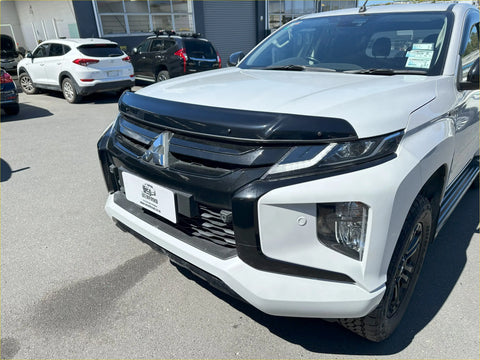 White mitsubishi triton with black grille and bumper showing bonnet guard protector stone guard 2019-2023 model