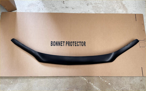 Black plastic bonnet guard protector with smooth curved design for toyota hilux 2021 plus matte black finish