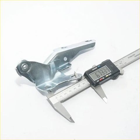 Silver metal bonnet hinge assembly with pivot joint and mounting holes for Toyota Hilux 2005-2015