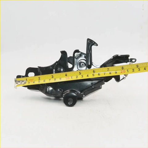 Black painted metal bonnet latch striker lock with yellow measuring tape for toyota hilux surf 1995-2002