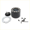 Black cylindrical steering wheel hub adapter with metallic flanges and blue wiring for Toyota Hilux N80 RN90 RN105 back view