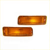 Pair of amber rectangular bumper bar indicator lights with ribbed lens and metal brackets for toyota hilux 1988-1997
