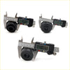 Black rubber cylindrical cabin mounting bushings for Toyota Hilux LN80 LN85 LN90 YN80 being measured with digital calipers