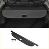 Black textured fabric trunk liner with rectangular handle and metal mounts for toyota bZ4X 2023-2025 cargo cover