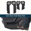 Black car door anti kick pads with white starburst cutouts shown installed on toyota land cruiser interior 2010-2012
