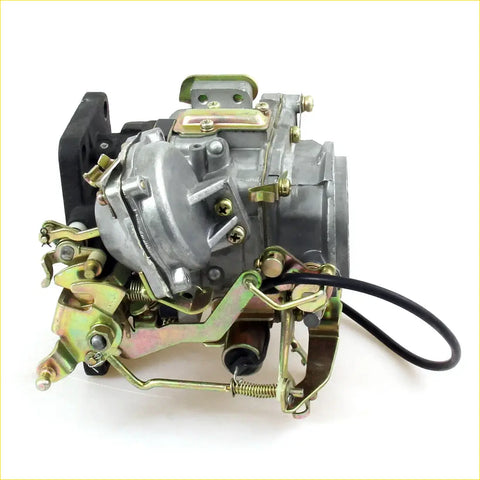 Gray metallic carburetor with brass components and black wire for toyota hilux toyoace 12r i4 engine back side