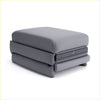 Gray leather centre console armrest ottoman with stitched edges and sleek modern design for car interior