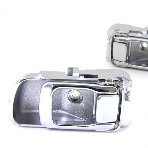Back side of chrome inner door handle bezel set for Nissan Urvan E25 Caravan with sleek modern design and visible mechanism