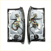 Pair of black rubber-trimmed chrome rear tail light assemblies with silver metal housings for mazda b series bravo back side