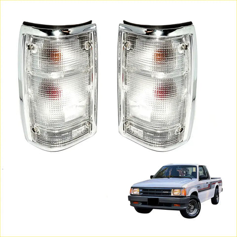 Pair of chrome rear tail lights for mazda b series bravo with clear textured lenses and amber red indicators