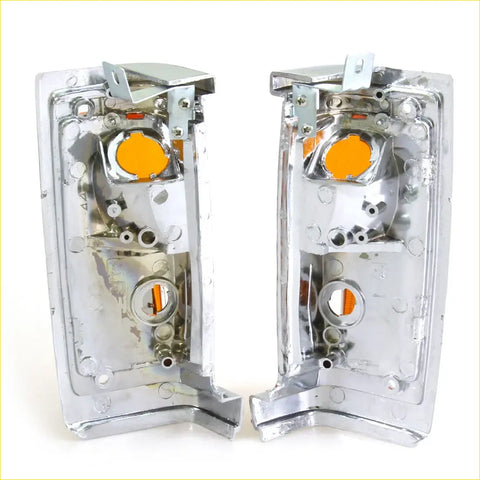 Chrome finished side turn lights with orange lens inserts for nissan d21 1986-1997 showing the back side