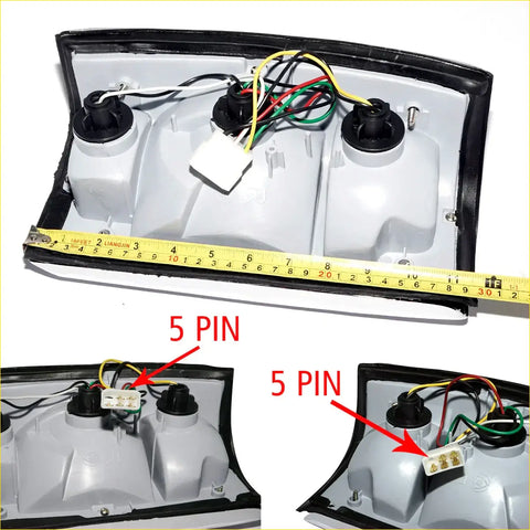 Gray plastic chrome tail lightset for mazda b series bravo with black rubber trim and five-pin wiring connectors back view