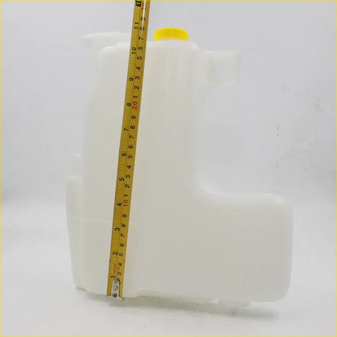 White plastic coolant reservoir tank with yellow cap for nissan frontier terrano navara np300 1997-2004 back side view