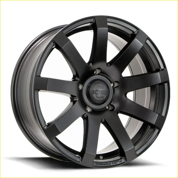 Matte black covet rv3 20x9 alloy wheel with multi-spoke design and center cap showing covington logo